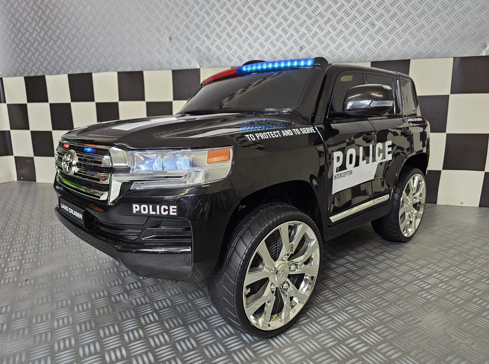 Elektrisches Kinderfahrzeug Toyota Land Cruiser Polizei 24Volt, 130 Watt Allrad, Polizeiauto für Kinder