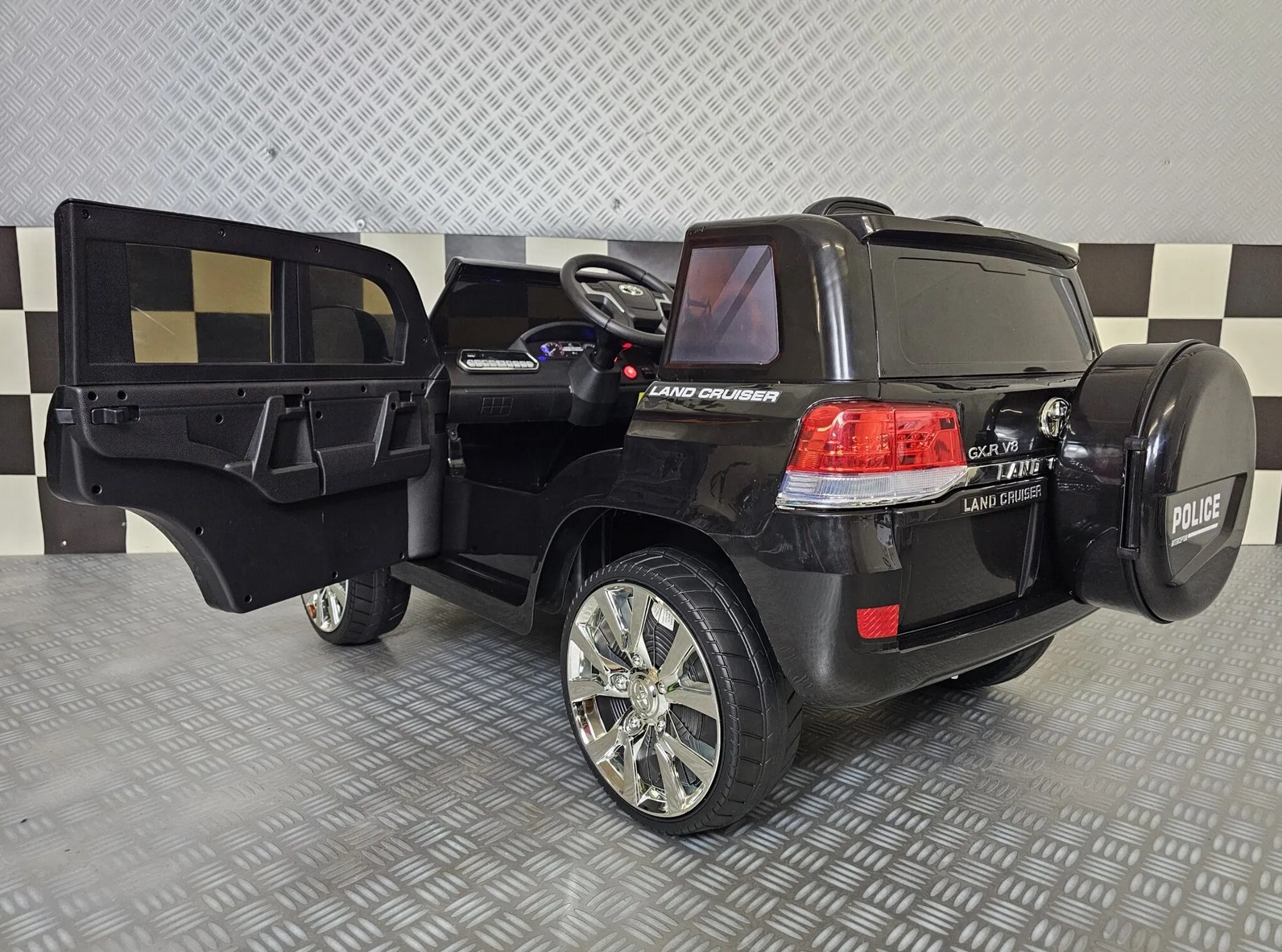 Elektrisches Kinderfahrzeug Toyota Land Cruiser Polizei 24Volt, 130 Watt Allrad, Polizeiauto für Kinder
