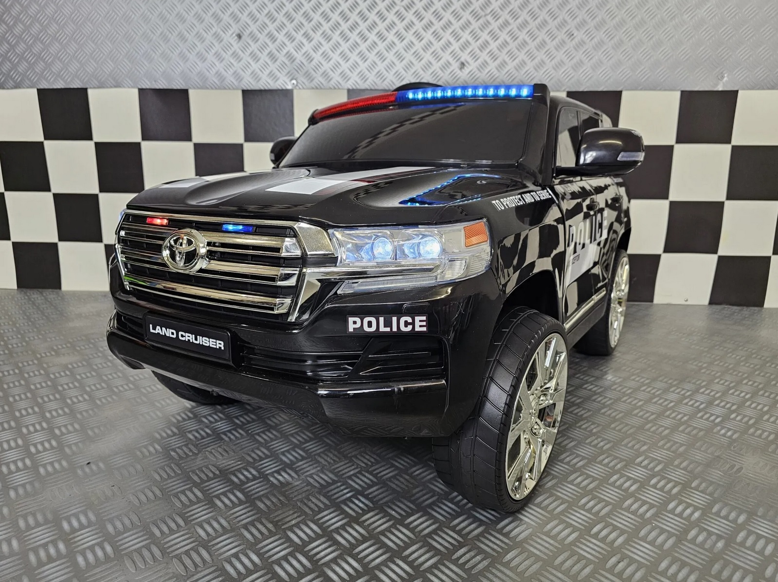 Elektrisches Kinderfahrzeug Toyota Land Cruiser Polizei 24Volt, 130 Watt Allrad, Polizeiauto für Kinder